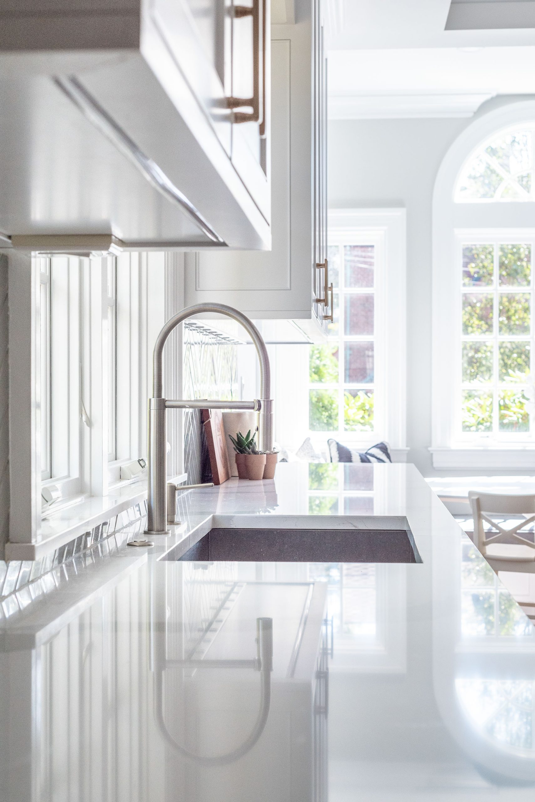 A bright kitchen interior with a sleek, modern look.