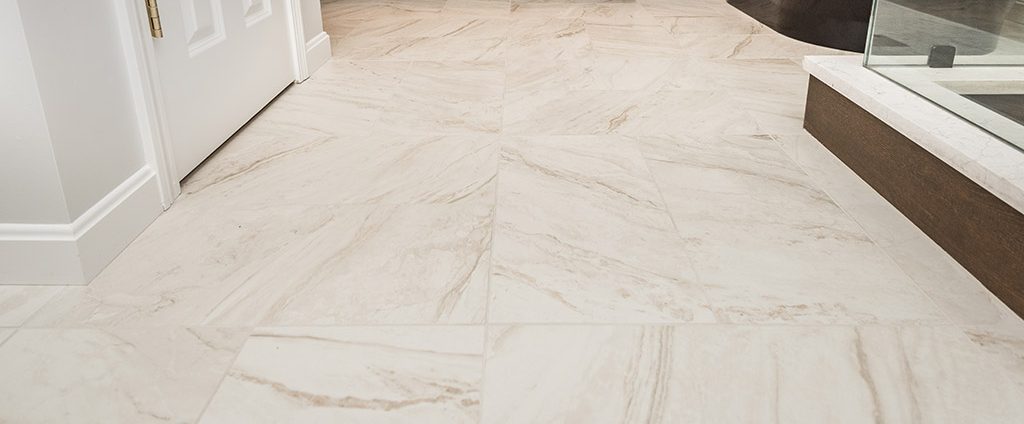 A beautiful marble tile floor complements a modern style home.